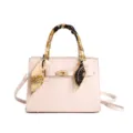 Elegant pink women handbag with stylish scarf handle and metallic lock closure for daily use. - White