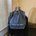 Casual denim canvas tote bag with large capacity, stylish shoulder and crossbody design for daily use. - No Pendant / Sand Washed Dark Blue