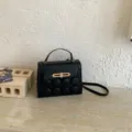 Black women handbag with unique round buttons and gold clasp, stylish small crossbody bag - Black