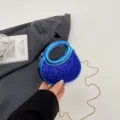 Glossy blue acrylic crescent evening bag with glitter finish and chic metal chain strap for party. - Blue