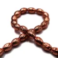 Copper electroplated volcanic stone barrel beads, ideal for DIY bracelets and jewelry accessories. - Rose Gold