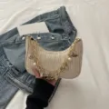 Woven hobo shoulder bag for women, stylish straw beach purse with chunky chain and shell charms. - White