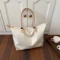 Large capacity nylon travel tote bag with leather handles for women weekend trip and gym use. - White