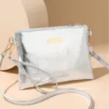 Silver metallic crossbody bag for women, stylish shoulder handbag with strap and gold hardware. - Silver