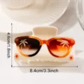 Summer beach style hair claw clip with sunglasses and palm tree print, detailed view. - Sunglasses Print Style