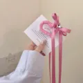 Ροζ κπλιμπρέ μαλλιών σε σχήμα καρδιάς με φιόγκο και στρασάτο κόσμημα για κορίτσια. - Ροζ κλάμερ καρδιά με στρας