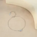 Sterling silver crescent moon bracelet with blue zircon stones, elegant and delicate jewelry. - White Gold Moon Bracelet