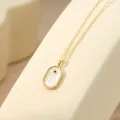 Gouden sterrenbeeld ketting met ovale parelmoer hanger en kristallen detail voor dames. - 14K Champagne Goud - Maagd