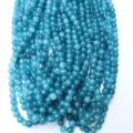 Close-up detail of blue cracked agate gemstone beads strands, vibrant color texture for jewelry. - 8mm / Approx 50 Pieces (8mm) / Sky Blue