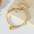 Bracciale con ciondolo di perline in metallo dorato gioiello minimal in acciaio inox - Bracciale