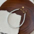 Bracelet de perles blanches élégant avec fermoir en argent 925 et chaîne d'extension. - Argent 925 / 4mm / Or
