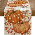 Detailed shot of autumn table runner featuring vibrant pumpkins and fallen leaves pattern. - Pumpkin Print Style