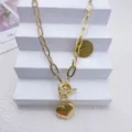 Collana con ciondolo a cuore in oro a catena grossa con chiusura OT per donne gioielli alla moda - Catena a strato singolo con cuore dorato