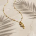 Collana con ciondolo cavalluccio marino dorato catena di perle stile oceano chic per donne. - Cavalluccio marino