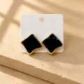 Orecchini geometrici nero e oro, gioielli di modo eleganti per abbigliamento quotidiano. - Piastrina quadrata nera