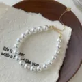 Bracelet de perles rondes brillantes élégant avec fermoir en argent S925 et chaîne d'extension cœur. - Argent 925 / 8mm / Or