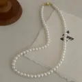 Elegant white pearl necklace with gold magnetic clasp for women fashion jewelry accessory. - 6mm / Gold