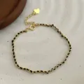 Pulsera trenzada de plata S925 para mujer, elegante cadena de oro entrelazada con cordón negro joya. - Plata 925 / Oro-Negro