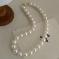 Elegant white round pearl necklace with magnetic clasp, chic minimalist fashion gift. - 12mm / Gold