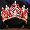 Luxurious Baroque red crystal bridal crown detailed shot, elegant gold tiara for wedding. - KC Gold with AB and Red Rhinestones