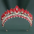 Close-up detail of the stunning bridal red crystal crown, featuring exquisite marquise rhinestones. - KC Gold White Diamond + Large Red Diamond