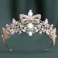Exquisite baroque rhinestone bridal crown detail with butterfly motif and iridescent crystals. - H1557 KC Gold with White & AB Rhinestones