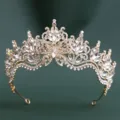 Close-up detail of luxury gold rhinestone crystal bridal tiara sparkling baroque hair crown. - H1560 KC Gold with White Rhinestones