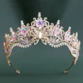 Detailed close-up of luxurious gold baroque tiara encrusted with colorful crystal rhinestones. - H1560 KC Gold with White & AB Rhinestones
