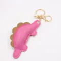 Cute pink dinosaur keychain with pearl pendant, detail view of bag charm and student gift. - Rose Red