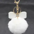 Fluffy faux rabbit fur pom pom keychain with rhinestone bow and gold hardware for bags. - Bowknot Style - Artificial Rex Rabbit Fur / White