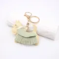 Porte-clés Chien Terrier Écossais en Cuir Mignon Frange Verte Pendentif de Sac Chic - Forme de Chien à Gland / Beige