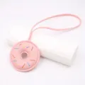 Handmade pink donut bag charm keychain with colorful stitch details for daily style. - Strap Style / Pink