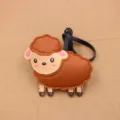 Detailed view of the cute brown sheep leather bag charm pendant with black strap craft. - Side-Standing Little Sheep Charms / Brown