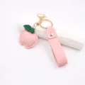 Pink leather peach apple keychain with green leaf, cute metal keyring bag charm pendant accessories. - Pink