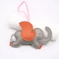 Cute grey leather elephant bag charm with orange wing detail and pink strap accessory. - Gray