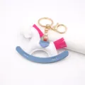 Leather rocking horse keychain cute bag charm stylish pony key ring golden hardware - White