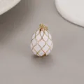 White enamel Easter egg pendant featuring a delicate gold mesh design, perfect DIY jewelry piece. - White Gold Grid Style (H-3610) / White