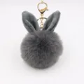 Fluffy grey rabbit ear plush pom pom keychain bag charm with shiny gold metal clasp. - Dark Gray