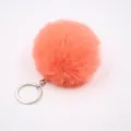 Close-up of fluffy orange pom pom keychain with silver metal ring, soft artificial fur texture. - 8cm Faux Fur + Single Ring Clasp / Orange Red