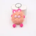 Cute fluffy rabbit plush keychain furry ball toy bag pendant claw machine ornament detail view - Sweet Pink