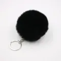Black faux fur pom pom keychain detail showing soft fluffy texture and silver metal ring. - 8cm Faux Fur + Single Ring Clasp / Black