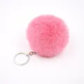 Close-up detail of soft fluffy pink faux fur pom pom keychain with silver metal ring. - 8cm Faux Fur + Single Ring Clasp / Deep Pink