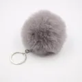 Close-up of fluffy grey faux rabbit fur pom pom keychain pendant, soft texture metal ring detail. - 8cm Faux Fur + Single Ring Clasp / Medium Grey