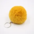 Yellow fluffy faux rabbit fur pom pom keychain detail shot, cute bag charm pendant. - 8cm Faux Fur + Single Ring Clasp / Turmeric