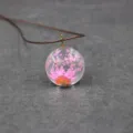 Exquisite pressed flower glass pendant necklace with pink dried daisies and cord chain detail. - 30mm / Rose Red