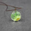 Close-up detail of green pressed flower resin pendant necklace, botanical forest style jewelry. - 30mm / Green + White