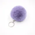 Close-up detail of the soft purple faux fur pom-pom keychain and metal ring hardware. - 8cm Faux Fur + Single Ring Clasp / Violet
