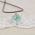 Handmade dried flower glass ball necklace with blue flowers and brown cord, fresh style. - Mint Blue