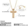 Detailed view of the stainless steel cross pendant necklace with sparkling cubic zirconia stones. - Model P895-A / 40.5+5cm / Gold