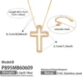 Detailed view of the gold-tone cross pendant necklace featuring sparkling zirconia stones. - Model P895-B / 40.5+5cm / Gold